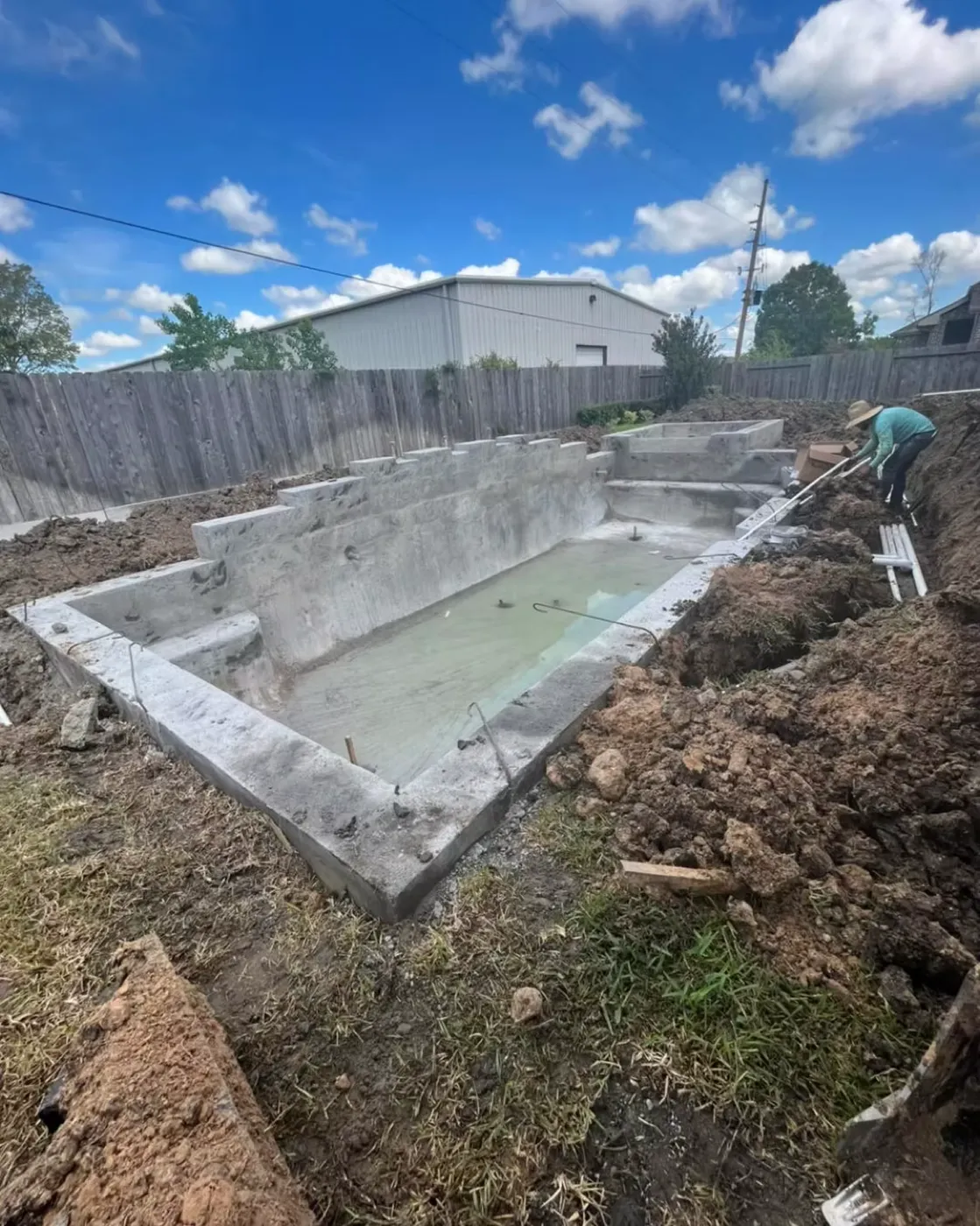 Concrete pool shell under construction