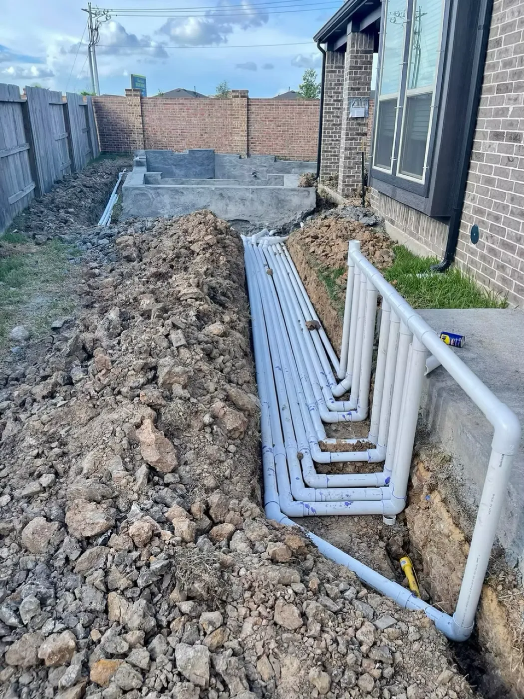 Pool plumbing being installed