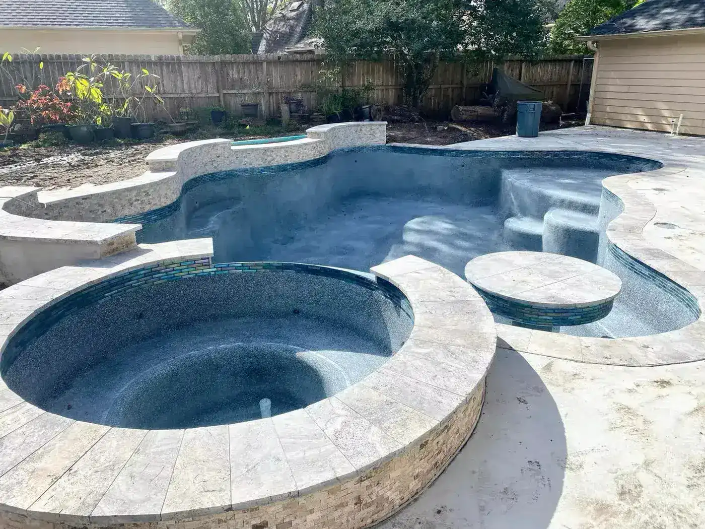 Freeform pool with round spa
