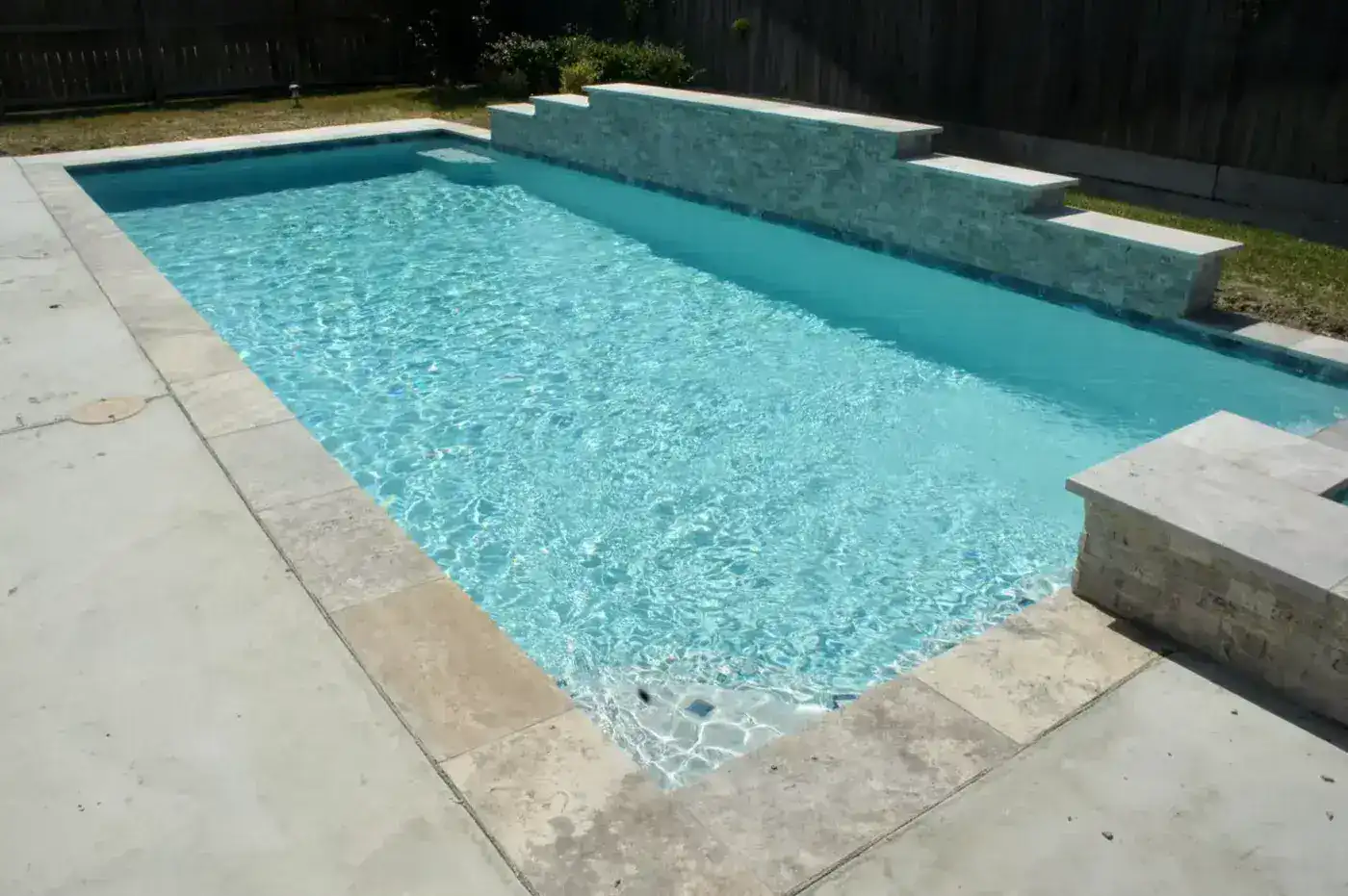 Rectangular lap pool with water wall