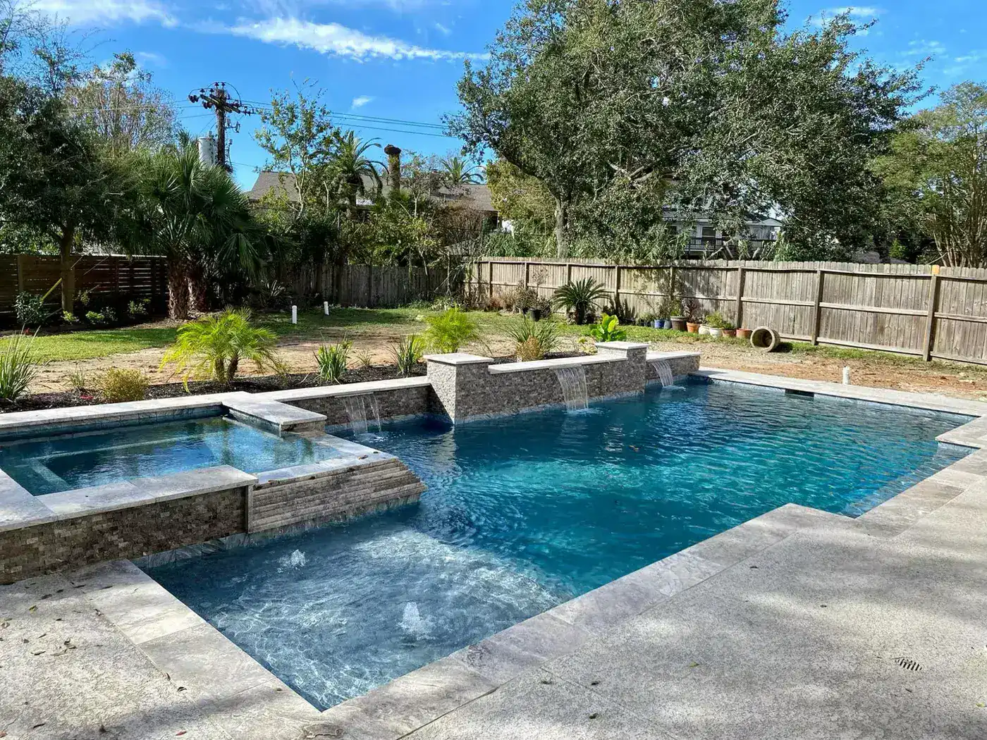 Pool with decorative water wall